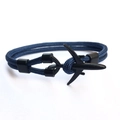 Blue woven paracord bracelet with black metal airplane clasp on white background - Blue (Dual Hole-10)