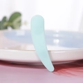 Minimalist light blue plastic cosmetic spatula for facial mask and cream applications - Solid Green