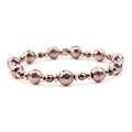 Elastic DIY beaded bracelet featuring faceted bronze metal beads and golden spacers - Bronze & Gold