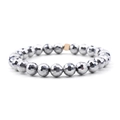 Elastic beaded bracelet featuring faceted metallic grey beads and a gold accent bead - Metallic Gray & Gold Bead