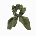 Detail of dark green fabric scrunchie with bow ribbons and soft pleated texture - Army Green