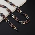 Detail of matte acrylic eyeglass chain in gold silver and black with rubber loops - Mixed Metallic (27)