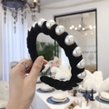 Black velvet headband with large white faux pearls in a stylish wide-brimmed design - Black