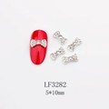 Ciondolo per unghie a fiocco in metallo argento con strass e misura di 5x10mm - Stile Strass Bianco Pavé Base Argentata (3282)
