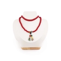 Ethnic red bead necklace with green jade pendant on a white mannequin display stand - Small / White Brushed Leather: Small
