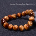 Bracciale di perle occhio di tigre naturale da 12mm con effetto gatteggiante dorato - Occhio di Tigre Solare Naturale (12mm)