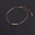 Detalle de pulsera infinito en oro rosa con cierre de mosquetón y cadena de extensión - 17cm+6cm / Oro rosa