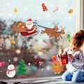 Christmas window stickers featuring Santa, reindeer, and snowman for holiday decoration - HM92034 Reindeer Sleigh and Santa