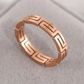 Rose gold titanium steel ring with Greek fret pattern displayed in a jewelry box - US 5 / Rose Gold