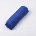 Detailed view of the crinkle texture on a rolled blue cotton linen scarf - Blue No. 19