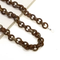 Close-up of amber acrylic chunky chain glasses strap with translucent tortoiseshell links - Amber Coffee