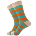 Close-up of orange and teal striped knitted crew socks with beige heel and toe accents - Khaki Blue Orange Stripes