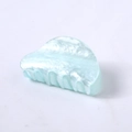 Detail view of mint blue acetate hair claw clip with marble texture and pearl finish - Aqua Blue Water Ripple Round Head