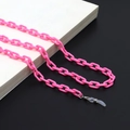 Detail of bright pink acrylic eyewear chain with lobster clasps and silicone loops - Rose Red