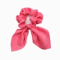 Close-up of vibrant rose red satin hair scrunchie with long elegant bow ribbon tails - Rose Red