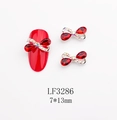 Dettaglio di ciondoli per unghie a fiocco con strass rossi e etichetta taglia 7x13mm - Stile Strass Rosso Goccia Base Argentata (3286)