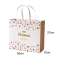 Große weiße und goldene Weihnachtstüte aus Papier mit festlichen Motiven und Henkeln - L / Gold