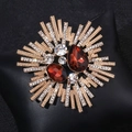 Vintage gold alloy flower brooch with deep red stones and sparkling crystals - Fuschia