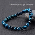 Natur-Tigeraugen-Armband aus hellblauen 6mm-Perlen mit einzigartigem Katzenaugeneffekt - Natürliches tiefblaues Tigerauge (6 mm)