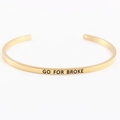 Golden stainless steel mantra bracelet with 'GO FOR BROKE' engraved text design - GO FOR BROKE