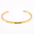 Golden stainless steel mantra bracelet with BELIEVE engraving in a minimalist open design - BELIEVE