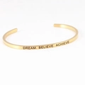 Minimalist gold stainless steel C-shaped cuff bracelet with Dream Believe Achieve engraving - DREAM BELIEVE ACHIEVE