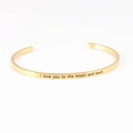 Golden stainless steel cuff bracelet with I love you to the moon and back engraving - I love you to the moon and back