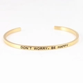 Gold stainless steel cuff bracelet with 'DON'T WORRY, BE HAPPY' engraved mantra - don't worry be happy
