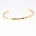 Gold-plated C-shaped cuff bracelet featuring engraved you are my favorite bitch quote - you're my favorite bitch