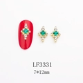 Détail d'un bijou d'ongle en cristal vert et alliage avec dimensions 7x12mm - Style Losange Diamant Vert Base Or (LF3331)