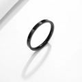 Minimalist black stainless steel band ring with sleek polished finish and shadow detail - Black