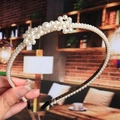 Detail shot of white woven pearl headband featuring exquisite floral pearl clusters - 3# Dense Cluster White Pearls