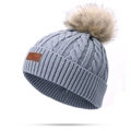Light blue cable knit beanie for children with khaki faux fur pompom and leather label - Single Pom Pom / Gray