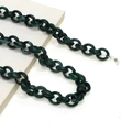 Close-up of dark green acrylic eyewear chain with marble texture and rubber loops - Dark Green Texture