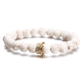 White marble bead bracelet with a gold crown charm centerpiece on white background - White Marble Gold Crown