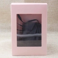 Detailed view of a pink kraft paper gift box with a clear PVC window and black ribbon - 12.5*8.5*1.5CM / Pink