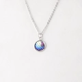 Macro detail of round mermaid scale pendant with blue and purple gradient on silver chain - Blue Purple Pink Gradient (11)
