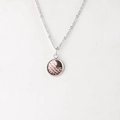 Macro shot of 12mm stainless steel necklace featuring a textured rose gold fish scale pendant - Rose Gold Fish Scale (12)