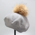 Detailed close-up of grey wool knit beret texture with a fluffy faux fur pompom on top - M (56-58cm) / Light Gray
