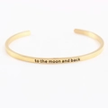 Gold stainless steel mantra cuff bracelet with To the moon and back engraving - to the moon and back