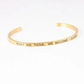 Gold stainless steel C-shaped open mantra bracelet with engraved buddha quote - WHAT WE THINK, WE BECOME