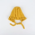 Detailed view of yellow baby knitted hat with cable knit texture and ruffle trim detailing - Kids (46-50CM) / Yellow