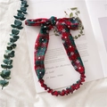 Bandeau de Noël à carreaux rouges et verts avec motifs de flocons et un nœud décoratif - Bordeaux