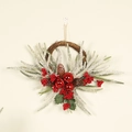 Detail of Christmas wreath with frosted pine needles, red berries, cones and bells - Three Bells - Red