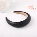 Macro shot of padded black leather headband featuring soft velvet lining for comfort - Padded Sponge Version / Black