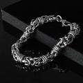 Men's bold titanium steel bracelet featuring a complex silver woven chain design - Silver