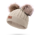 Kids beige cable knit beanie featuring double brown faux fur pom poms and leather tag - Double Pom Pom / Beige