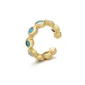 Dettaglio macro del polsino dell'orecchio in ottone dorato con zirconi blu e dimensioni 12mm - Zircone Celeste Placcato Oro