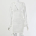 Detail view of white long sleeve dress with V-neckline and elegant drawstring ruffles - S / White