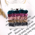 Detail view of 5-piece velvet scrunchies set in elegant candy colors on a display card - Velvet Bright Colors 5-Pack